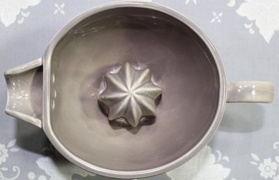 Top view of a taupe ceramic deep jug juicer