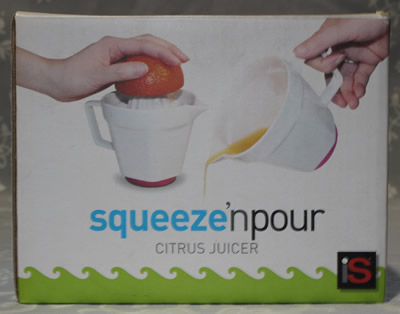 Hexagonal pattern reamer on a white ceramic 2 piece juicer