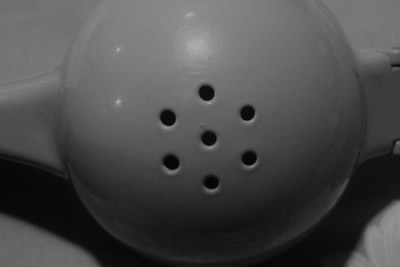 The drain hole pattern on this powder coated aluminium squeezer