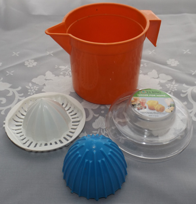 4 parts of Dark orange, blue and white jug juicer