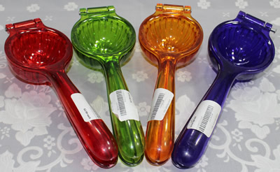 The 4 colours of the hinged plastic hand held squeezers