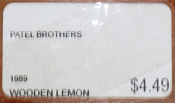 Bar code label on the hinged "WOODEN LEMON" hand held squeezer