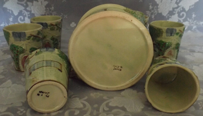 Base of blue thatch roof cottage juicer set with 6 tumblers