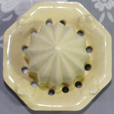 The reamer for a blue and pink flower on jug juicer