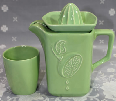 The matching tumbler for a green Diana Ware jug juicer