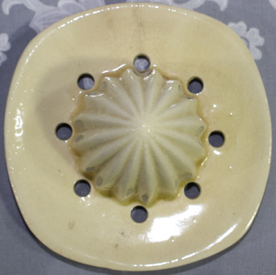 Reamer for a beige & brown with flowers ceramic juicer