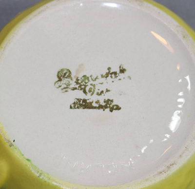 Beswick basemark on a yellow 'peel' juicer