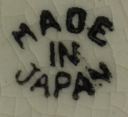 The basemark on a Japanese cupid cane handle bucket juicer