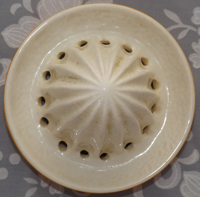 The reamer for a squat Crown Devon Orange 'peel' & white juicer