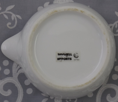 The sticker on a Savwell imports large white fruit 3 piece juicer
