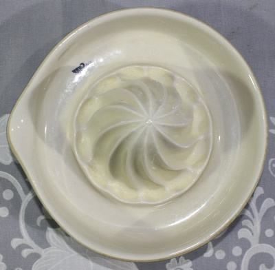 Top view of a grey green Mason Cash juicer