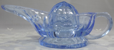 Side view of blue glass 'Aladdins Lamp' juicer
