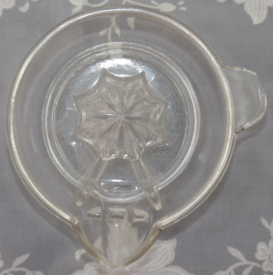 Top view of a Cambridge Glass clear glass juicer