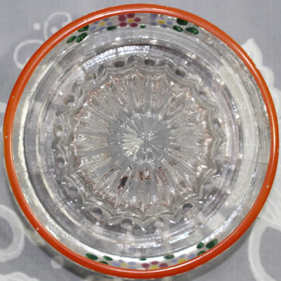 The reamer for a Westmoreland Specialty Co. clear glass 'Baby's Orange' juicer