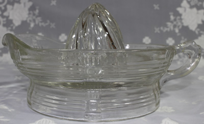 Side view of Hazel Atlas 'Crisscross' large glass juicer 