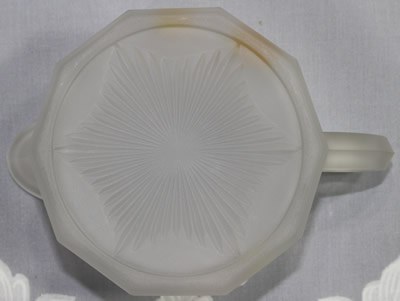 The base of a Westmoreland Specialty Co satin Baby's Orange juicer