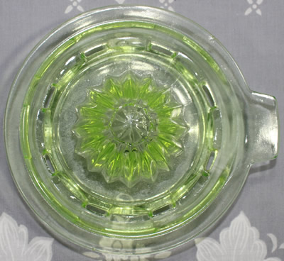 The reamer for a Hazel Atlas T & S HANDIMAID green uranium glass juicer