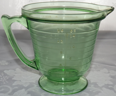 Back view of a Hazel Atlas T & S HANDIMAID green uranium glass juicer jug