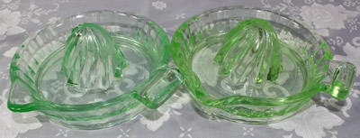 Two green colours of a clockwise spiral 1 piece glass juicer