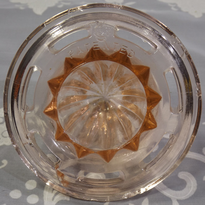 "PATENTED" and US Glass Company logo on etched pink 2 piece juicer