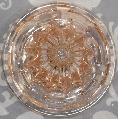 Reamer for a 2 piece pink U.S. Glass Company juicer set with a 'tear drop' handle