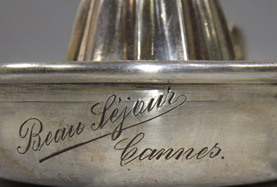 Engraving on Bohrmann silver plate loop handle juicer