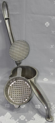 An open Jupiter aluminium press juicer
