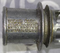 Embossed trade mark on a British Juictractor screw in aluminium juicer