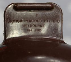 Embossed brand on a dark brown British Plastics Pty Ltd - Melbourne (Australia) plastic saucer juicer