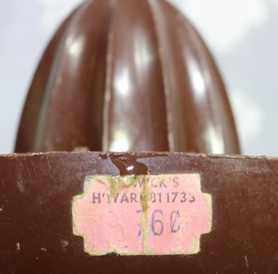 1970s price label on a dark brown British Plastics Pty Ltd - Melbourne (Australia) plastic saucer juicer