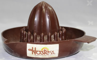 Hostess label on a dark brown British Plastics Pty Ltd - Melbourne (Australia) plastic saucer juicer