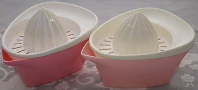 Pink and light pink and white plastic 2 piece juicer