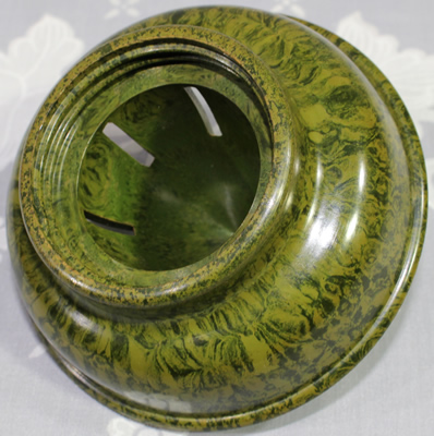 Bottom view of Jubilee mottled green Bakelite juicer for glass jar