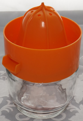 Orange and white Gemco 3 piece juicer open
