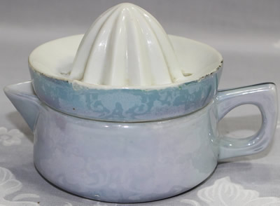 A lustre blue and white 2 piece ceramic juicer