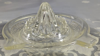 Greek key pattern clear glass juicer