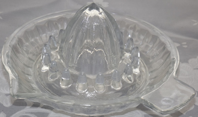 Small cone clear glass juicer