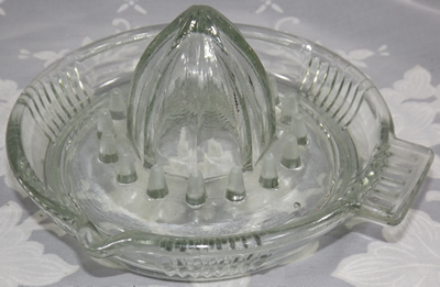 Ribbed tab handle saucer clear glass juicer