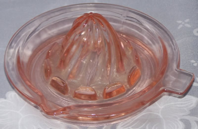 Small Hazel Atlas Pink glass saucer juicer