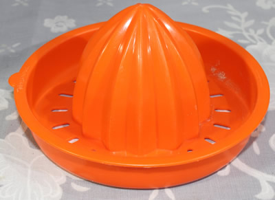 Orange Tupperware juicer top