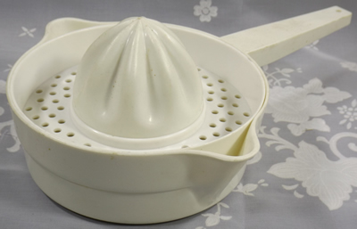 White with blue base Florida citrus juicer