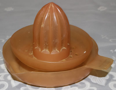 Australian Duperite Everware translucent orange plastic 2 piece juicer
